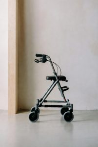 A rolling walker, also known as a rollator.