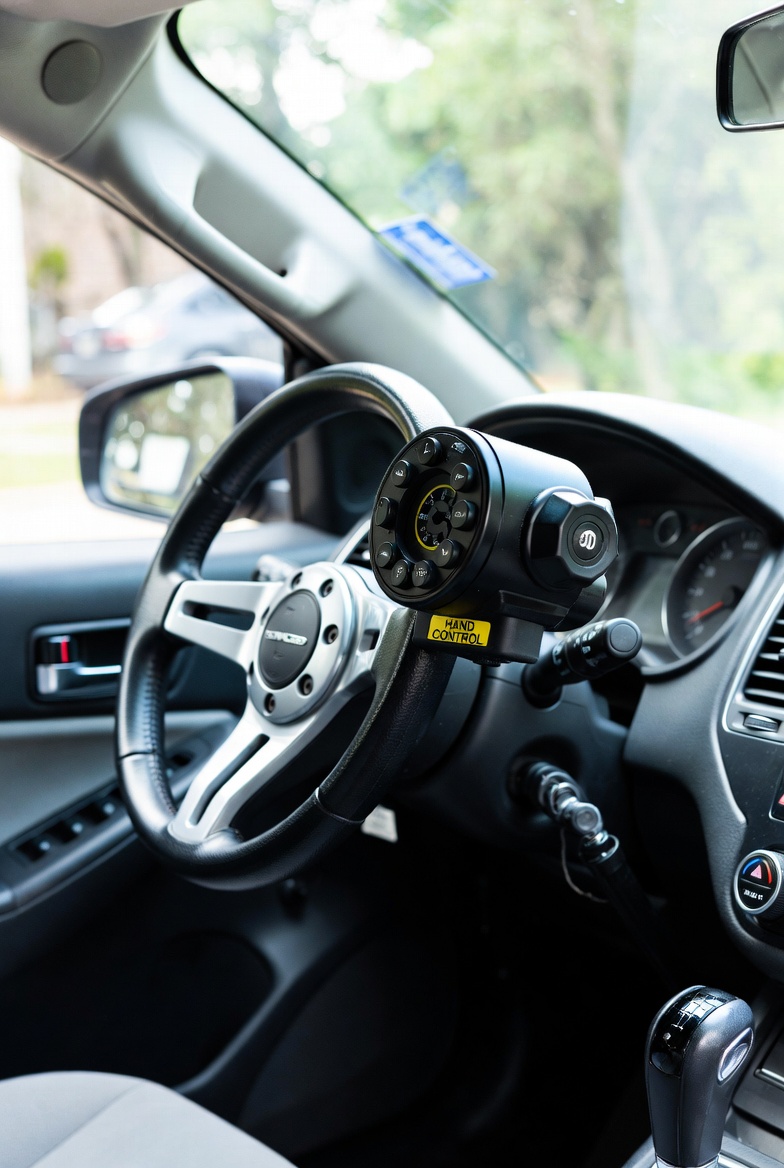 Car Accessory Generic Pictured is a car accessory adaption for someone with a disability.