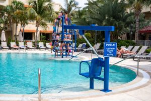 A pool lift is shown with a sign that reads not a toy